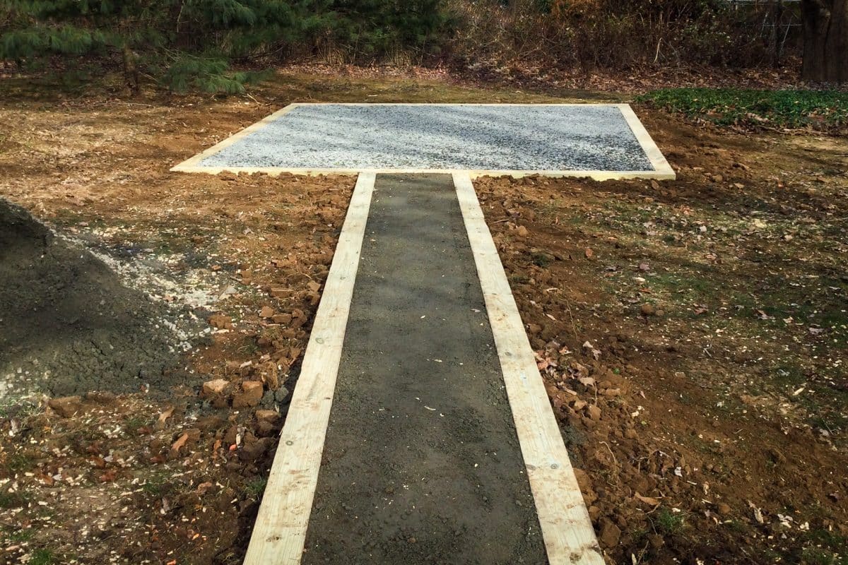 A gravel pad for a garden path and shed
