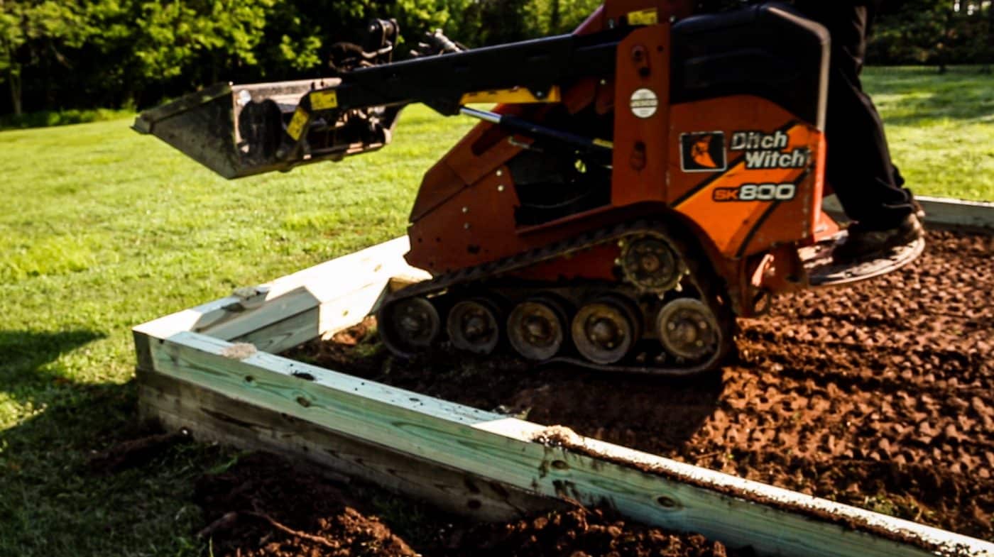 How to install a gravel shed foundation with a mini skid steer