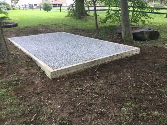 A crushed stone foundation for a shed in Wilmington, DE