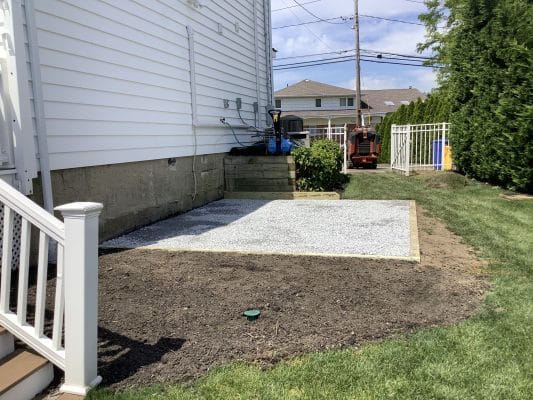 A crushed stone foundation for a shed in Massapequa, NY