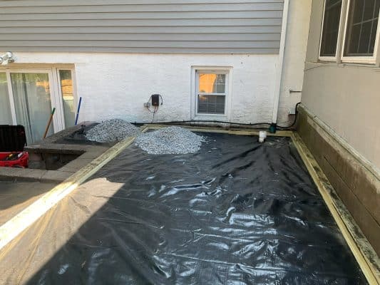 vapor barrier installation for turf for backyard with dogs