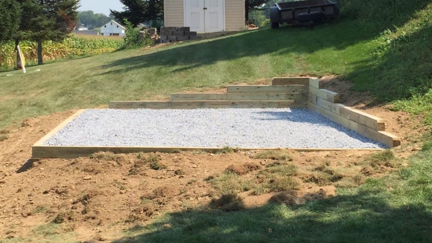 install shed pad retaining wall