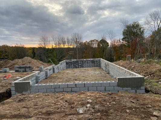 A concrete garage foundation being installed in PA